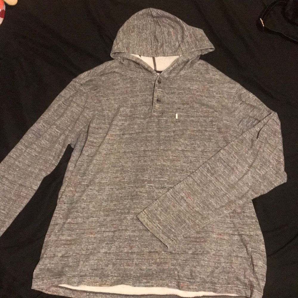 This is a grey and red long-sleeve shirt.